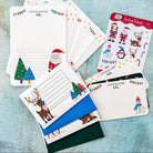 Letters, sticker sheet, postcards, and themed envelopes as part of the festive friends writing set