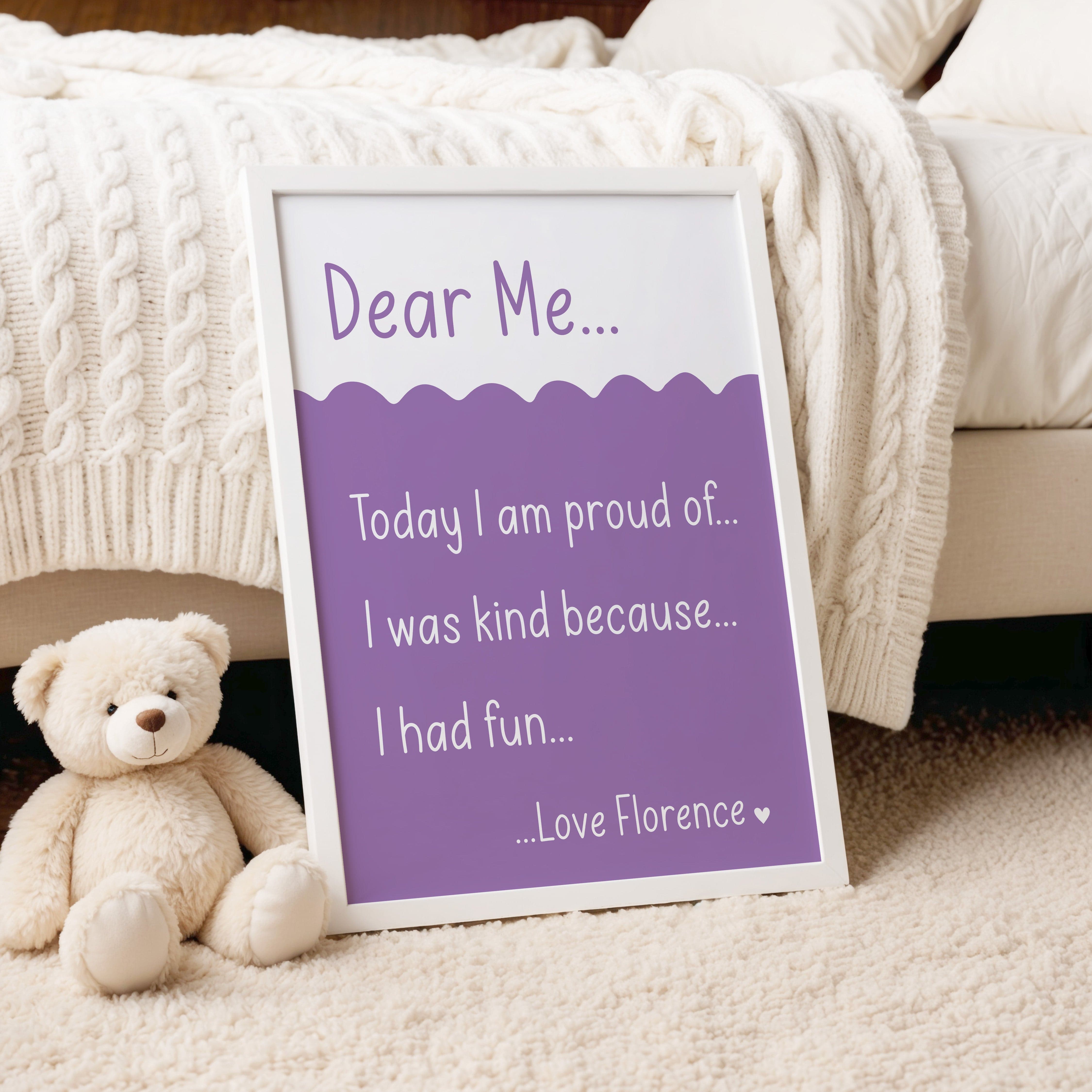 Purple 'Dear Me' print in a relaxed setting, propped against a blanket with a plush bunny alongside.