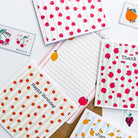 Striped greetings cards on textured cardstock with matching stickers