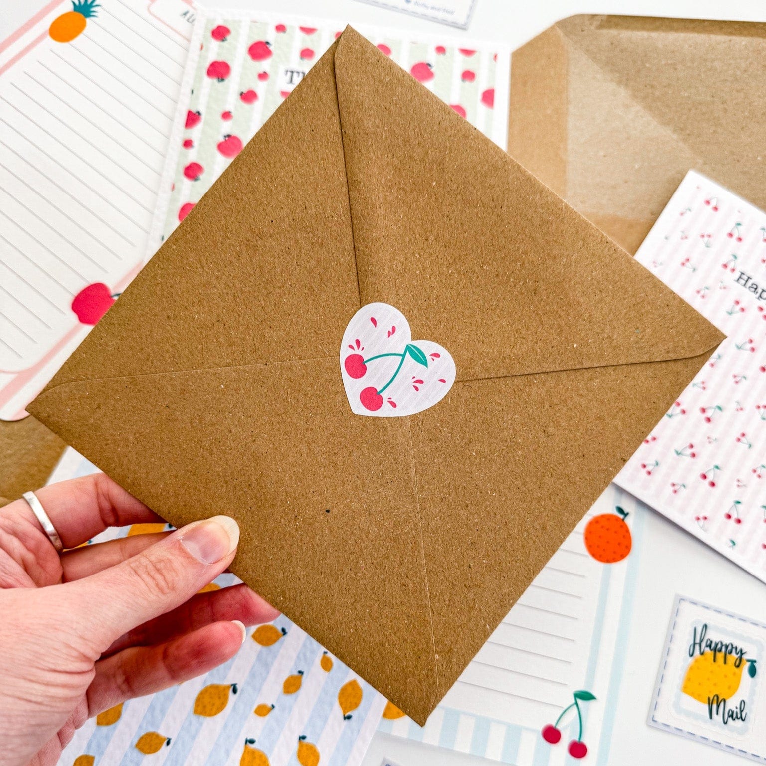 Cute heart shaped sticker with a cherry for ealing the kraft envelopes