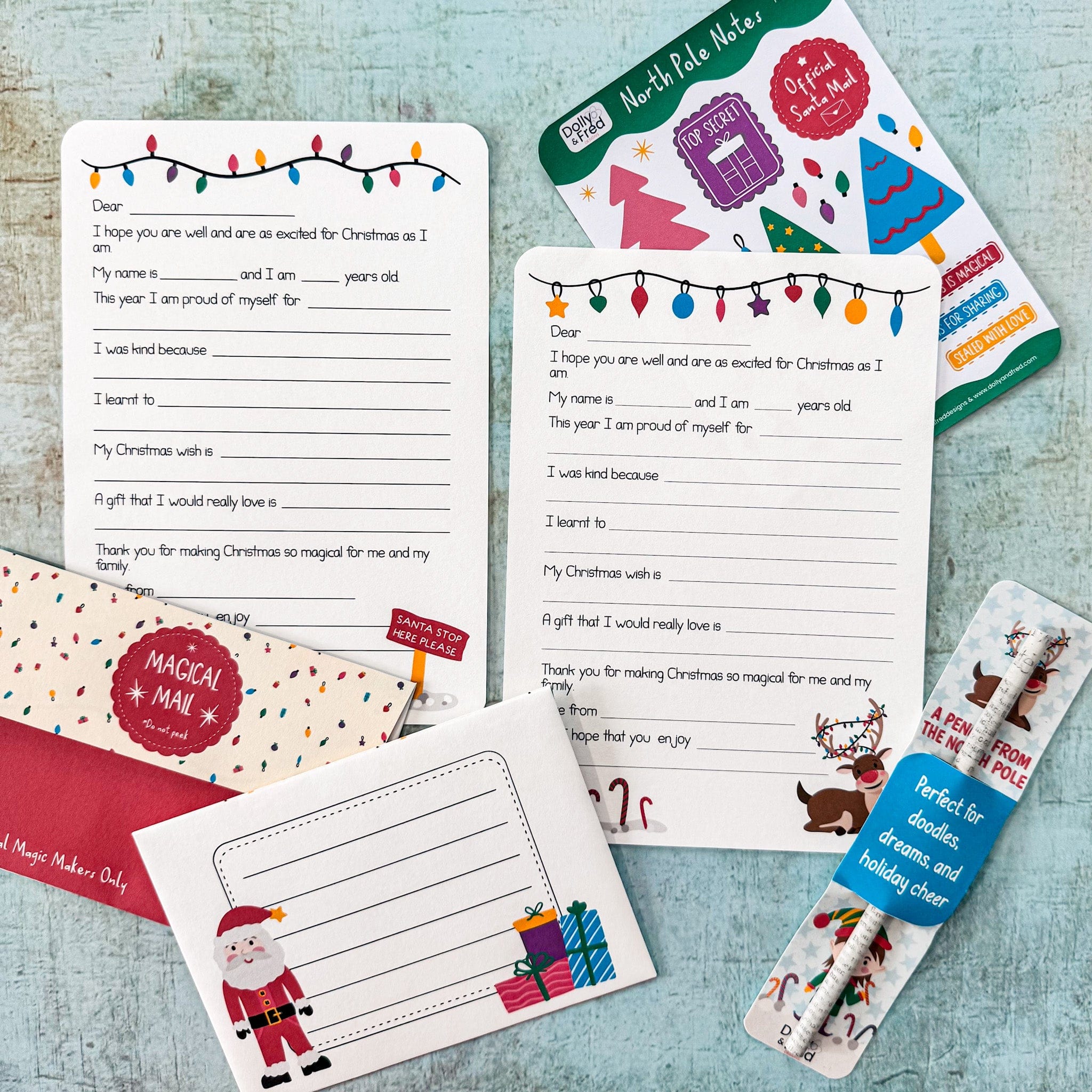 flat lay of letter to santa kit and festive themed pencil