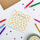 Folded greetings card with peaches, kraft envelope, and sticker sheet