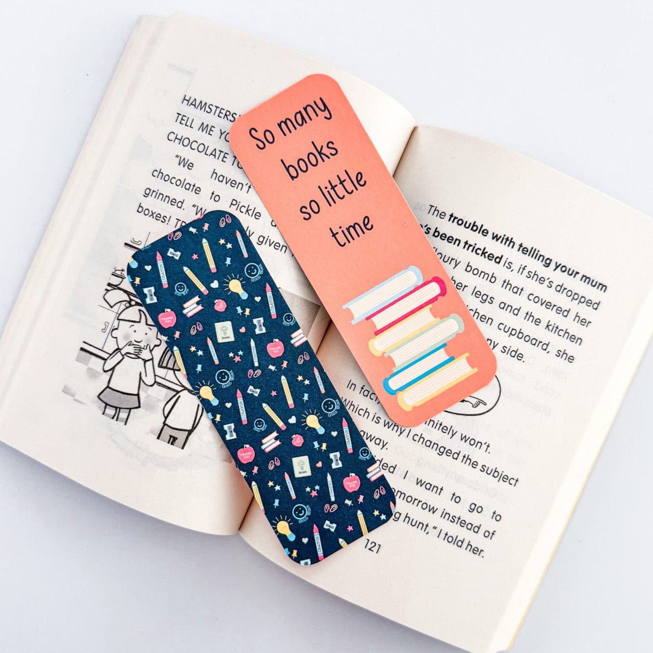 Colourful affirmation bookmarks on book pages