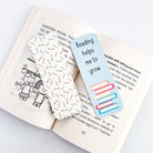 Affirmation bookmarks displayed on open book