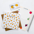 Front of lemon stripe greetings card with 'thank you' message, kraft envelope, and stickers