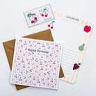 Fun cherry-themed card with bright red stripes and matching stickers