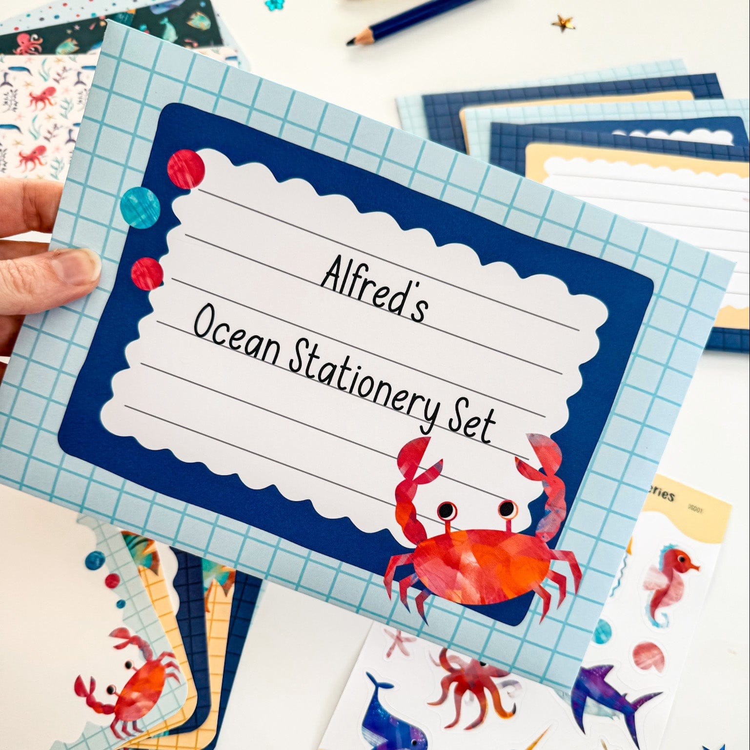 Beautifully packaged under-the-sea letter writing set with a fun ocean design.