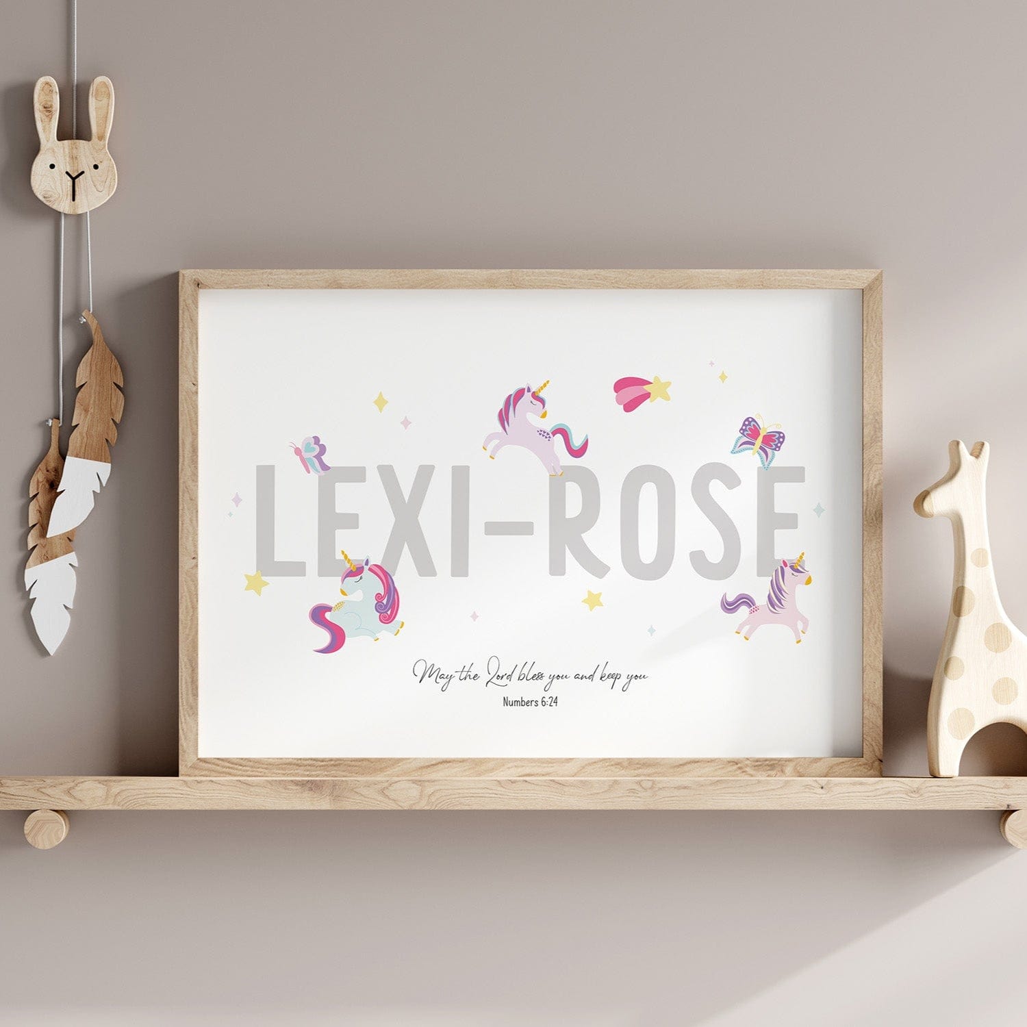Faith-filled unicorn name print with Bible verse Numbers 6:24 – personalised Christian wall art in a soft-toned girls’ bedroom