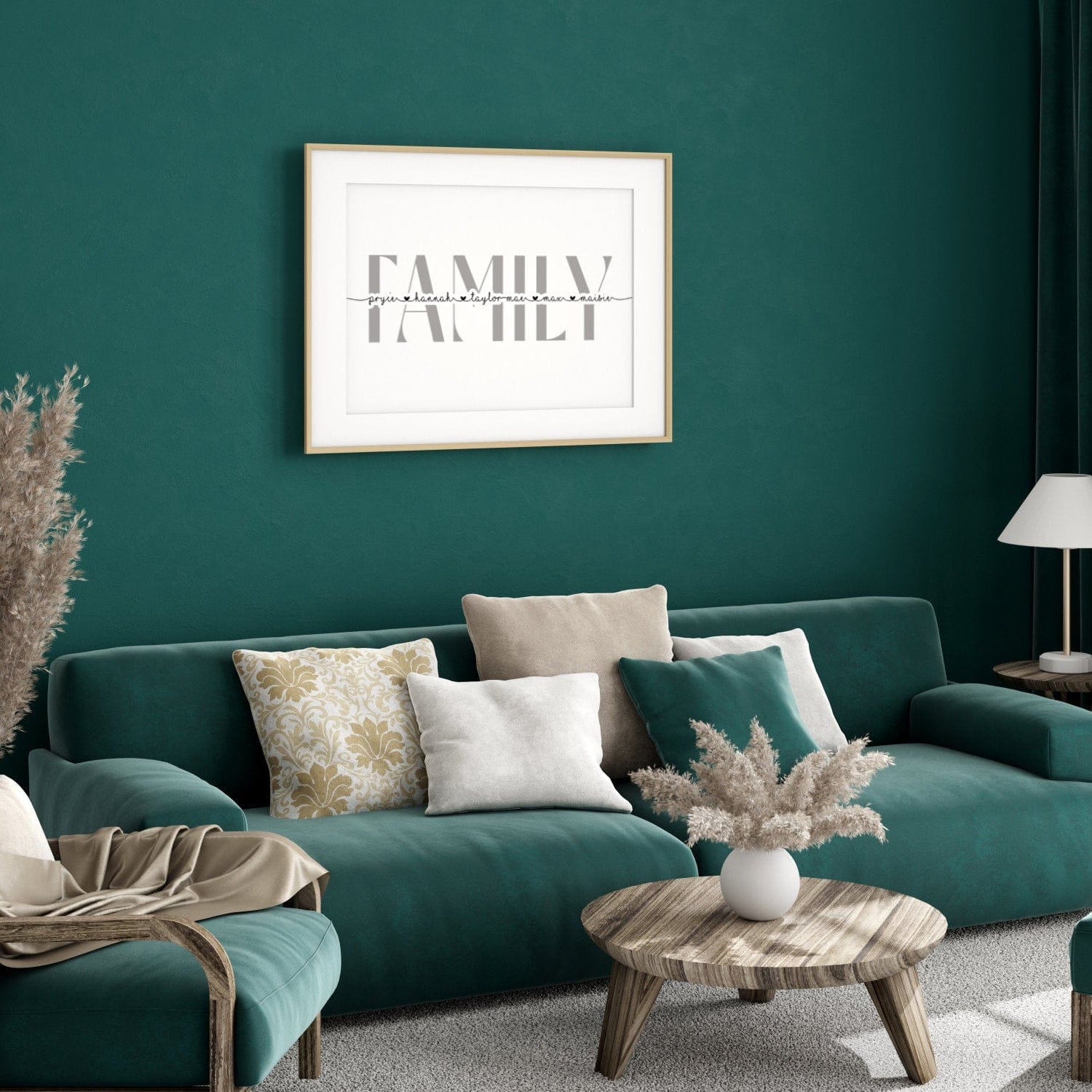 Modern living room with teal sofa, decorative pillows, and a 'Family' framed picture on a dark green wall.