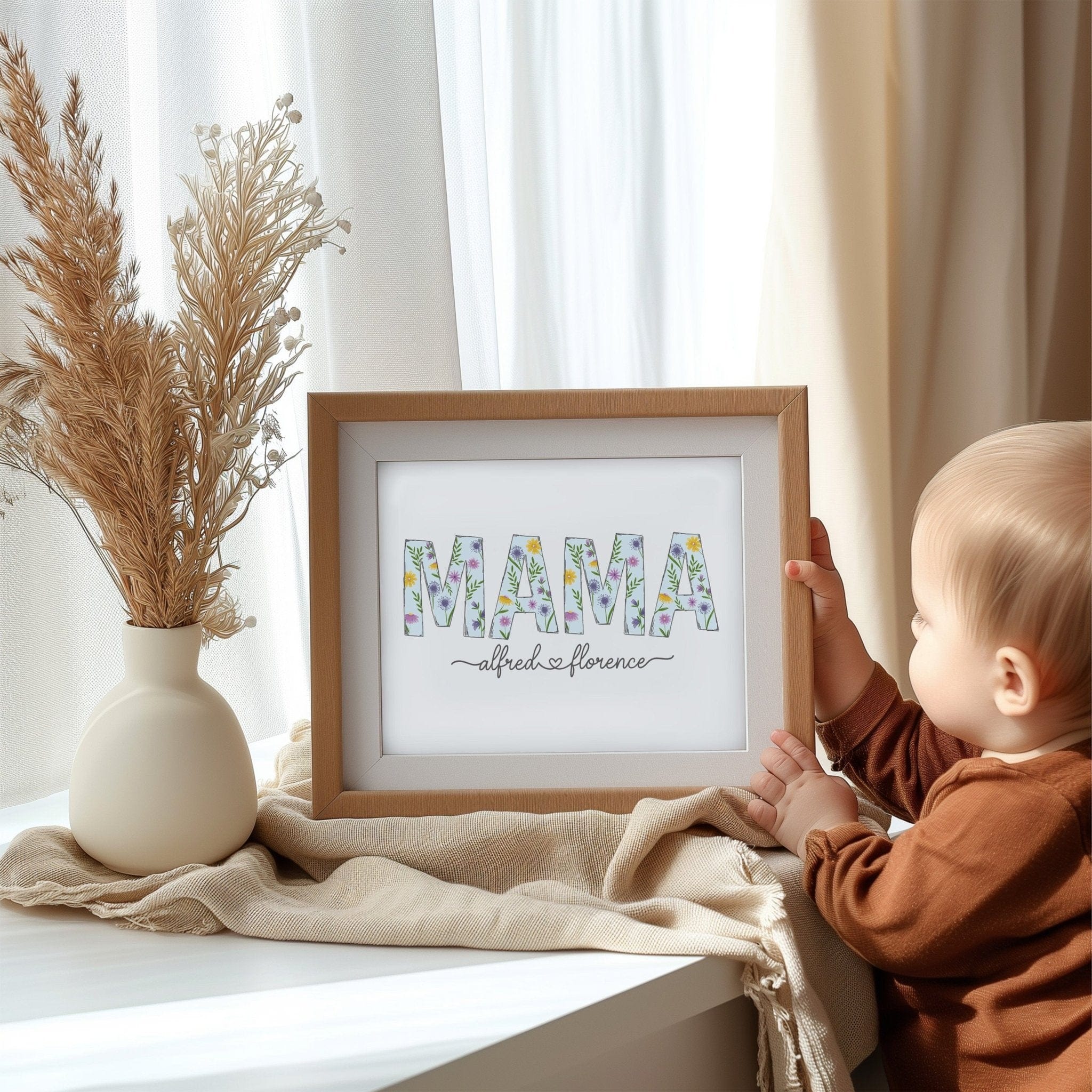 Child interacting with a framed picture on a table with decorative elements.