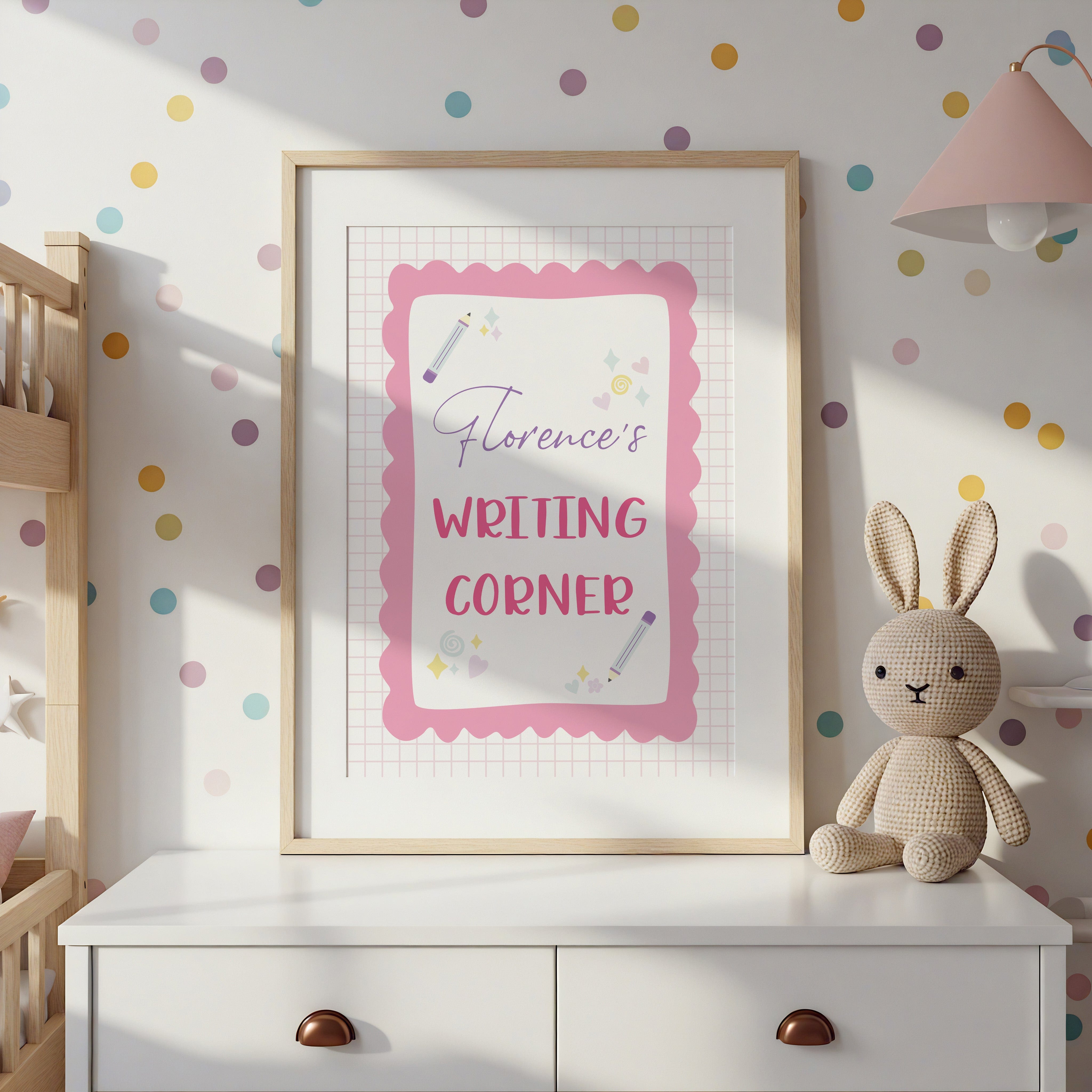 Personalised Writing Corner print styled in a pastel girls' bedroom with bunny toy and polka dot wall