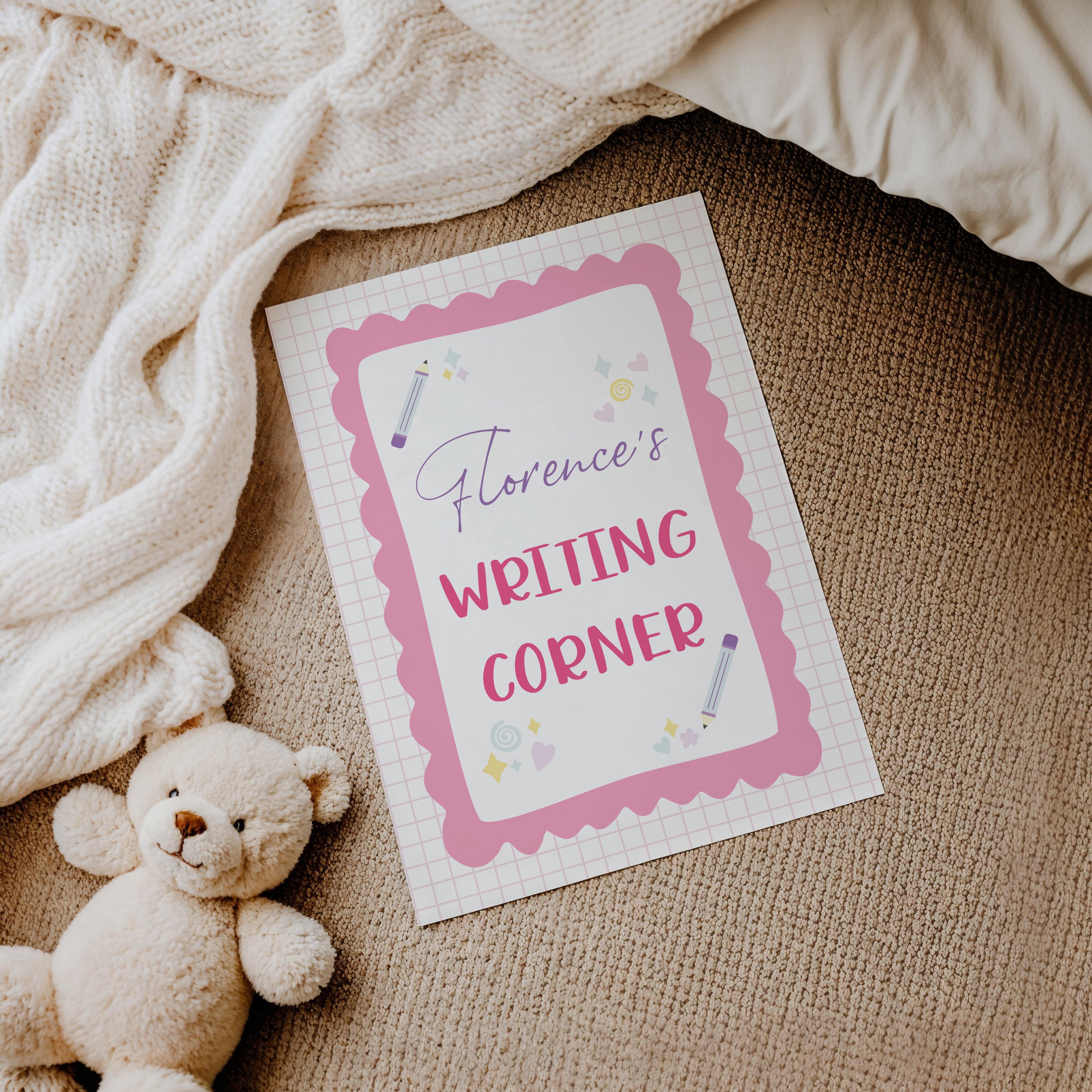 Flat lay of pink personalised Writing Corner print on soft blanket with plush toy