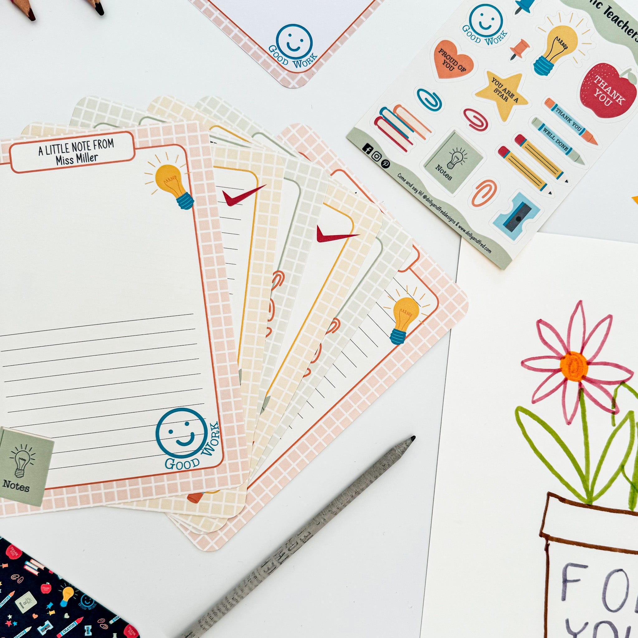 Top view of end-of-term teacher writing set with letter paper, bookmarks and stickers.