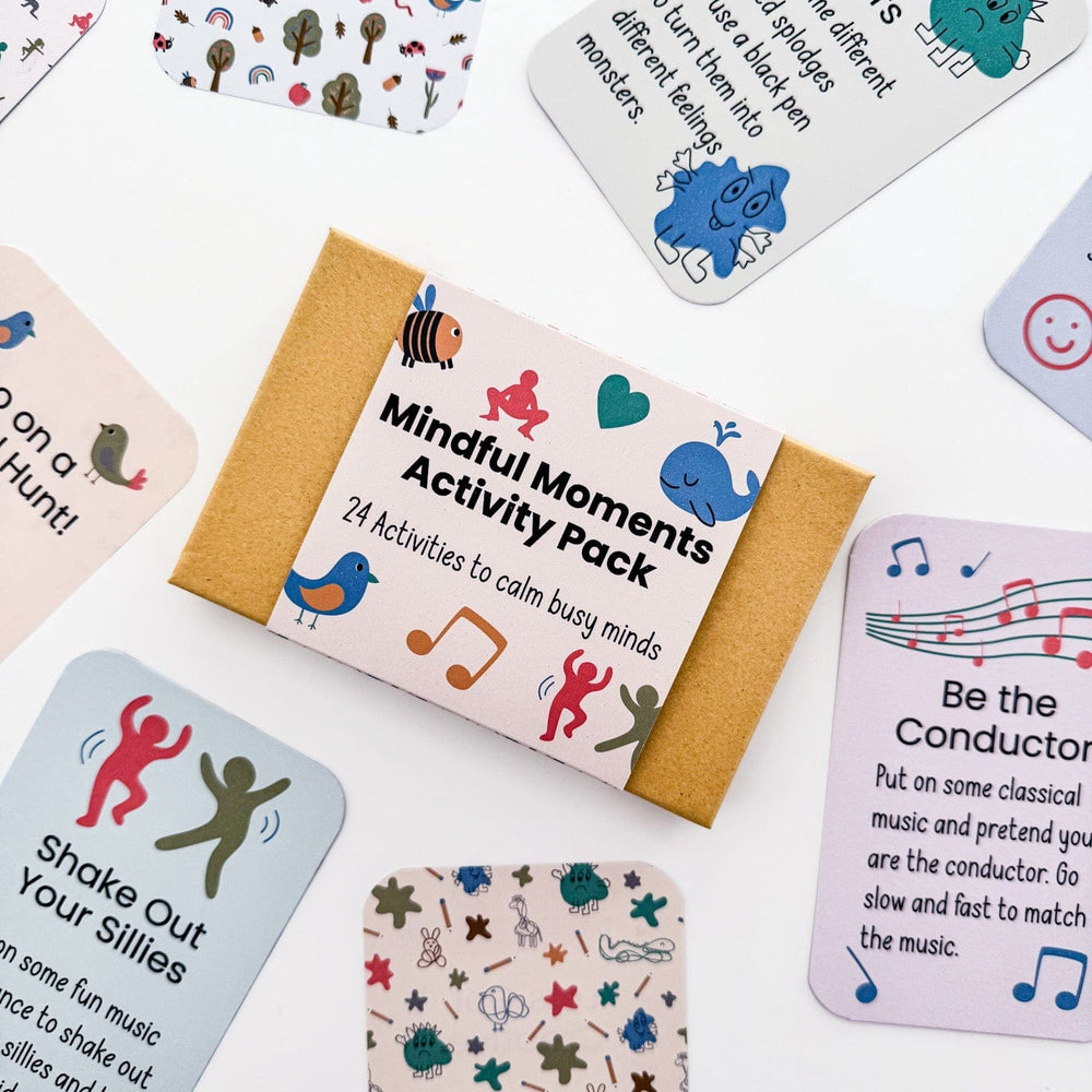 Flat lay of Mindful Moments Activity Pack showing mindfulness cards and eco-friendly kraft storage box.
