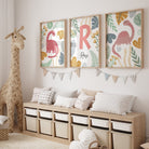 Children's room with dinosaur-themed wall art, storage bench, and large stuffed giraffe.