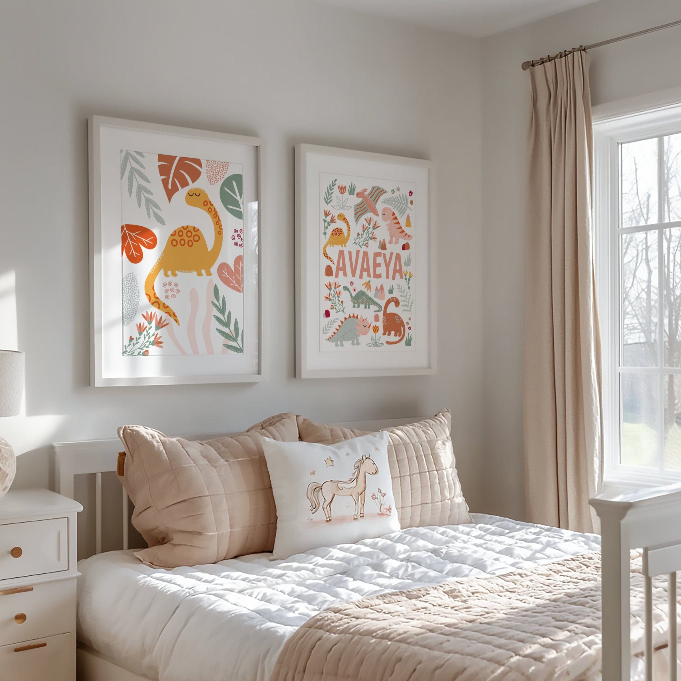 Children's bedroom with framed dinosaur artwork, pillows, and a bed.