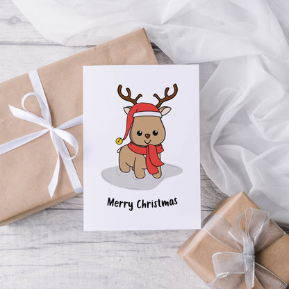 Reindeer in a hat christmas card - Dolly and Fred Designs